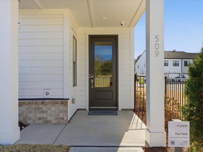 Representative exterior details of a home built from the York by Tri Pointe Homes in Grahym at Southbridge, Fort Mill (Image 3). Representative exterior details of a home built from the York by Tri Pointe Homes in Grahym at Southbridge, Fort Mill (Image 3).