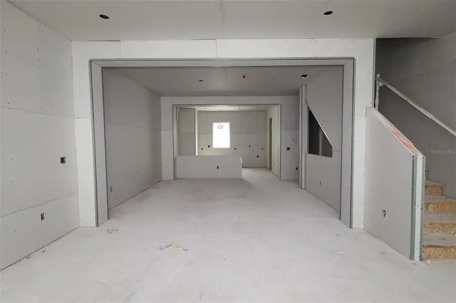 In-progress construction of a new home in Towns at Union, St. Petersburg, FL (Image 14).