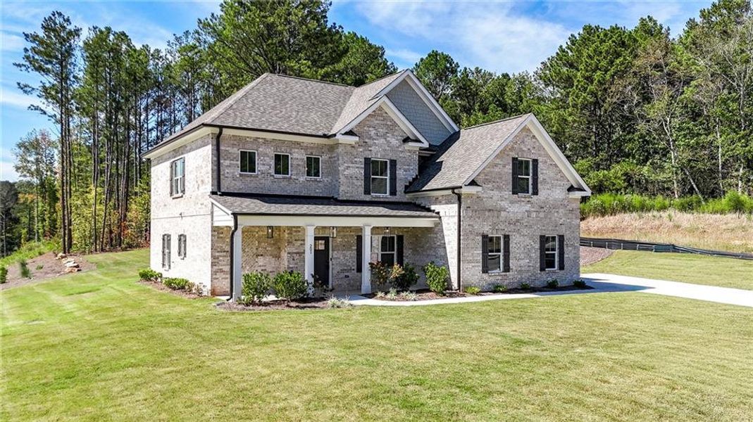 Front exterior of a new home in , Ellenwood, GA, highlighting curb appeal (Image 28).