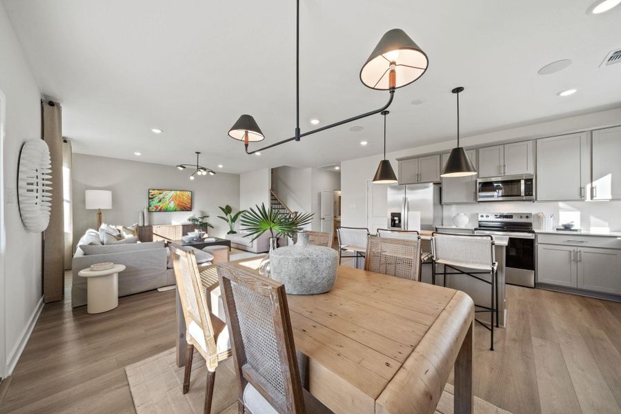 Photo of Pulte model home with same floor plan, not of actual home listed.