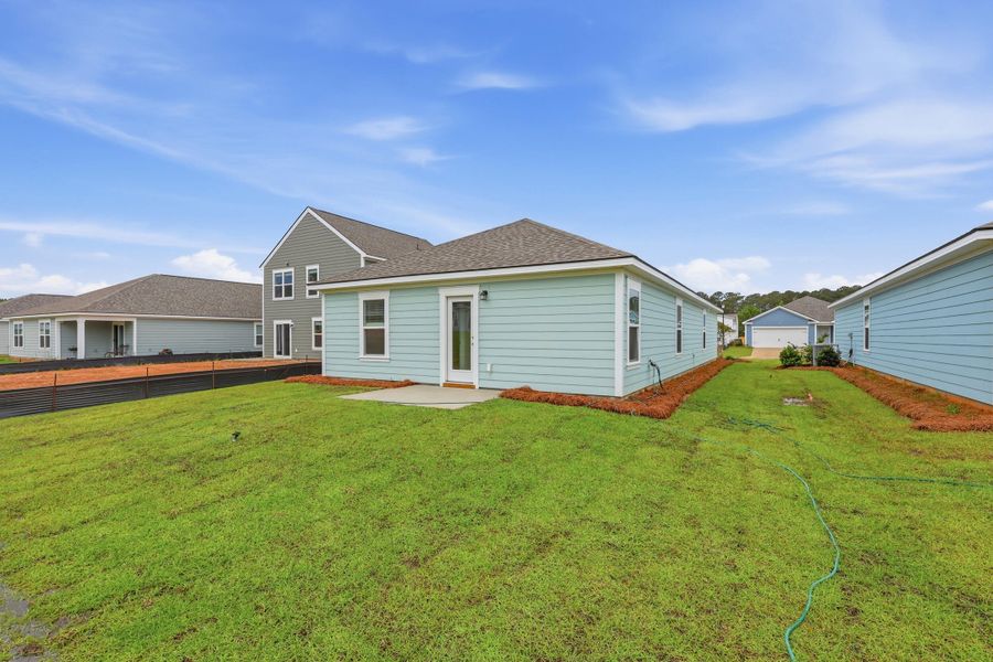 Exterior details and patio area of a home in Center Pointe, Santee (Image 2).