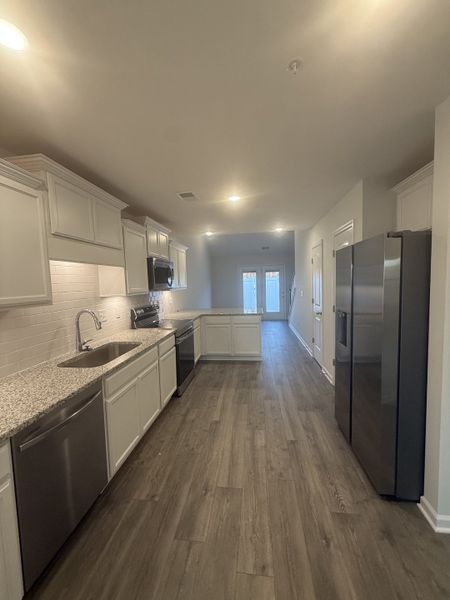 Furnished interior view inside a new home in Legacy Fields, Pleasant View (Image 4).