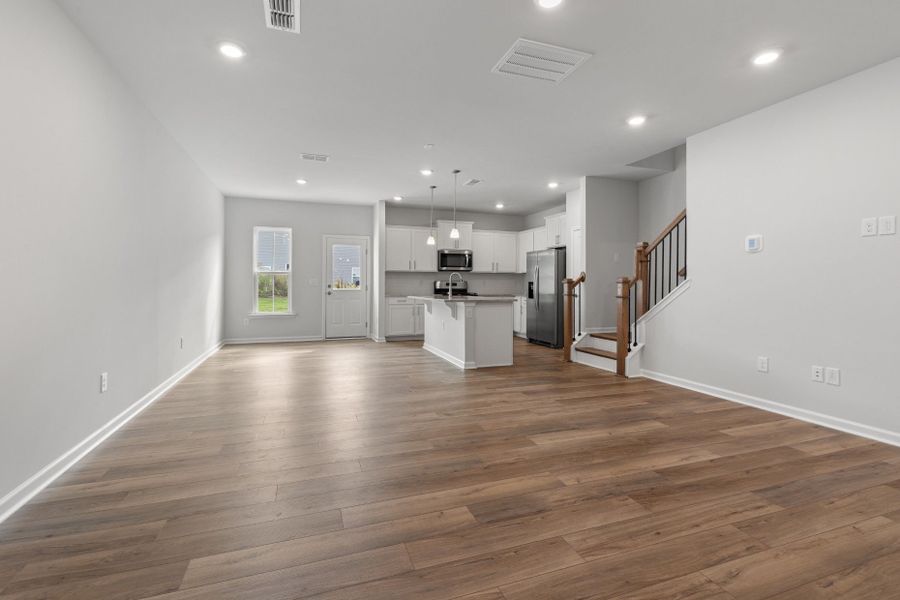 Spacious, unfurnished interior of a new home in Poets Walk, Whitsett (Image 13).