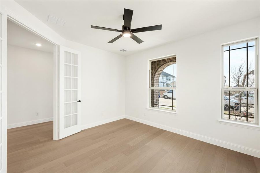 Spacious, unfurnished interior of a new home in Painted Tree Woodland District 50, McKinney (Image 22).