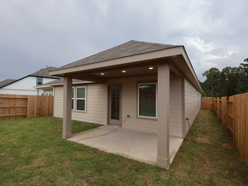 Front exterior of a new home in Indian Springs, Crosby, TX, highlighting curb appeal (Image 12). Front exterior of a new home in Indian Springs, Crosby, TX, highlighting curb appeal (Image 12).