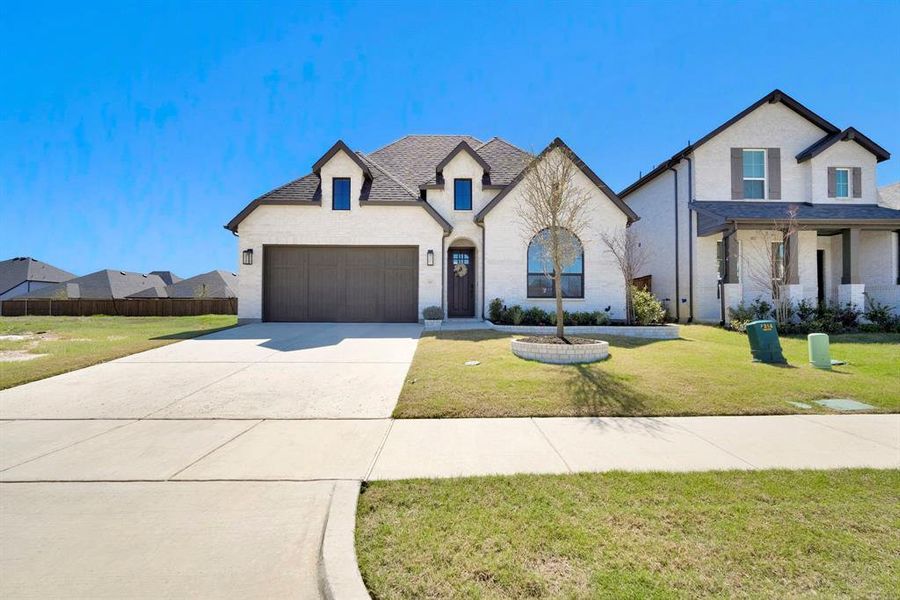 Front exterior of a new home in , Midlothian, TX, highlighting curb appeal (Image 21).