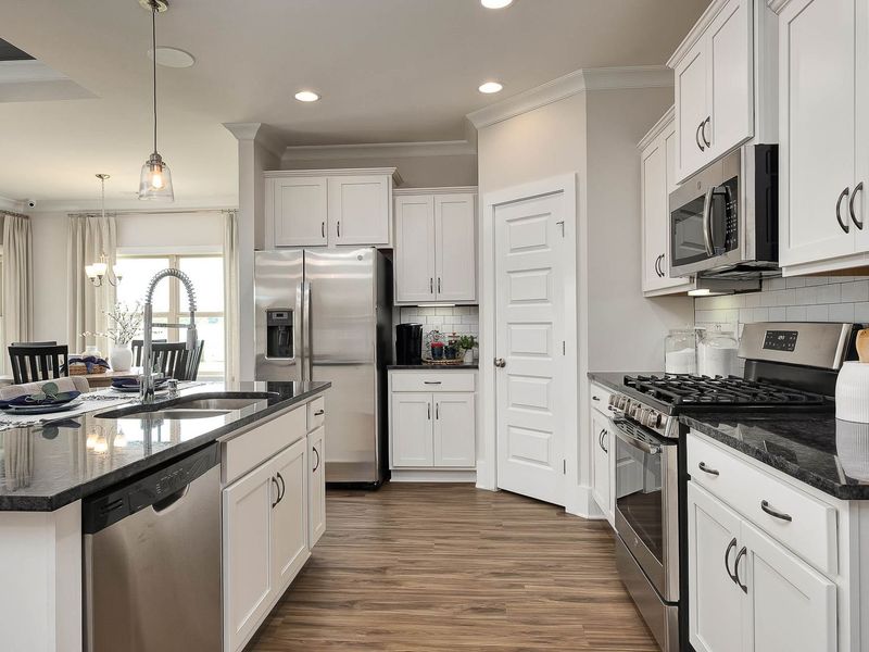 Representative furnished interior of a home built from the The Daphne E by Davidson Homes LLC in Bailey Park, Fayetteville (Image 22).
