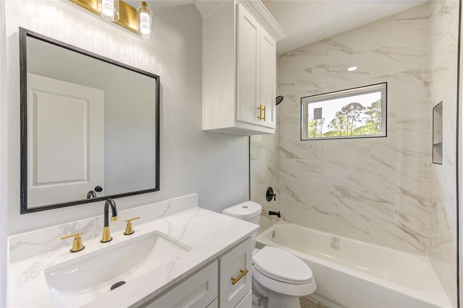 Furnished interior view inside a new home in , Woodbranch (Image 13).