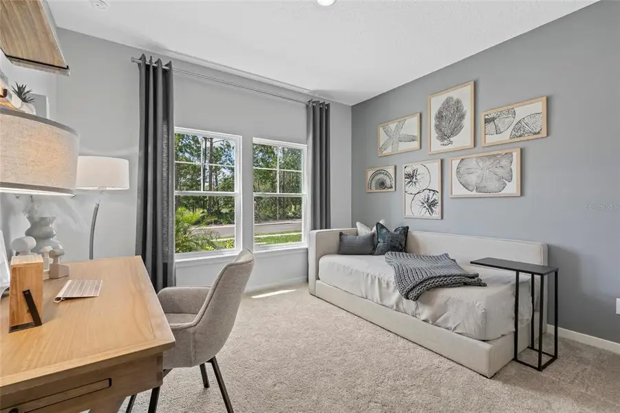 Furnished interior view inside a new home in The Magnolia Series at Reserve East, Flagler Beach (Image 13).