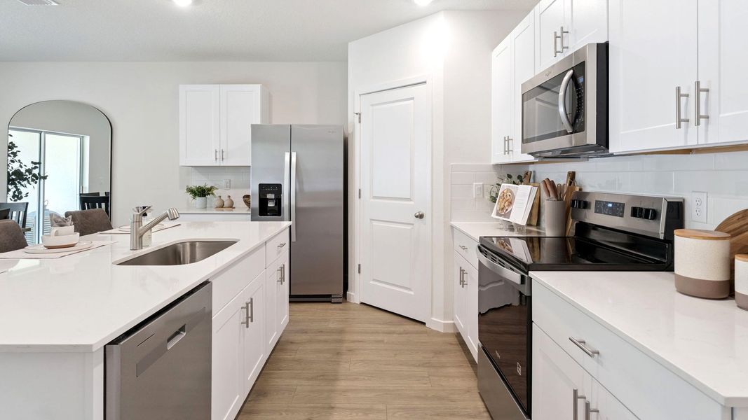 Furnished interior view inside a new home in Crossroads at Kelly Park, Apopka (Image 7).