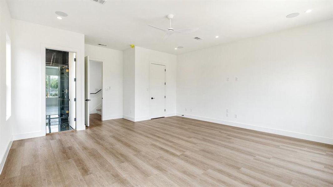 Unfurnished bedroom featuring light hardwood / wood-style floors