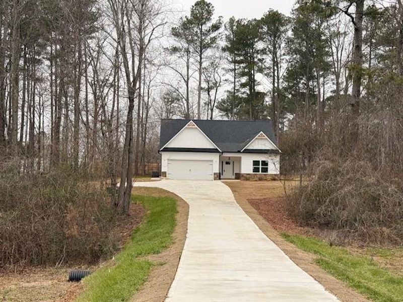 Front exterior of a new home in , Rockmart, GA, highlighting curb appeal (Image 11).