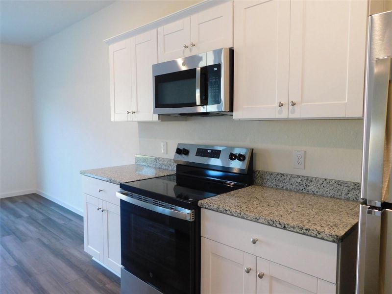 Furnished interior view inside a new home in Royal Pines, Porter (Image 5).