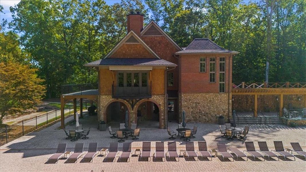 Front exterior of a new home in River Rock, Ball Ground, GA, highlighting curb appeal (Image 23).