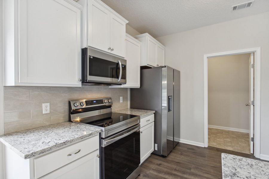Representative furnished interior of a home built from the The Stafford by RTS Homes in The Pointe at Villages on Marne, Hinesville (Image 16).