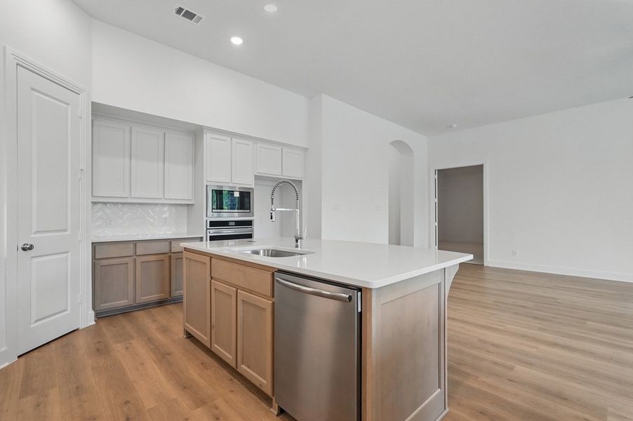 Representative furnished interior of a home built from the Chesterfield by Highland Homes in Davis Ranch, San Antonio (Image 6).