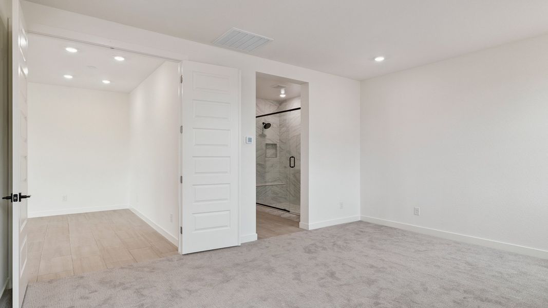 Spacious, unfurnished interior of a new home in The Ridge at Stone Butte, Phoenix (Image 30).