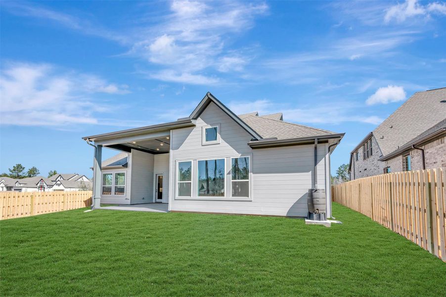 Another view of this oversized lot that easily accommodates a future pool!