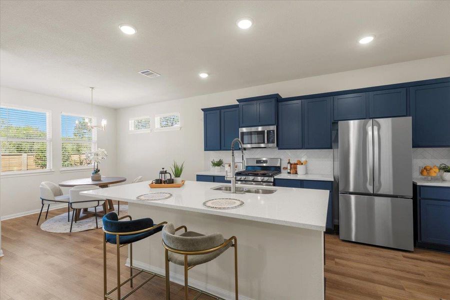 The kitchen takes center stage in the home.