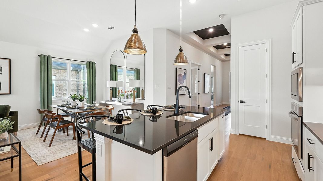 Representative furnished interior of a home built from the Juniper by Brightland Homes in Anna Ranch, Anna (Image 5).