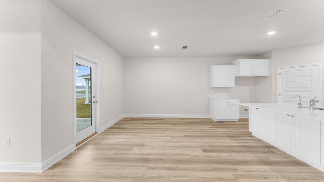 Representative unfurnished interior of a home built from the The Rhett by D.R. Horton in Hodges Bayou Plantation, Panama City (Image 25).