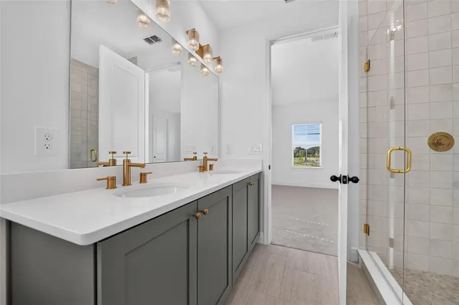 Furnished interior view inside a new home in Lake Cawood Cove, Windermere (Image 6).