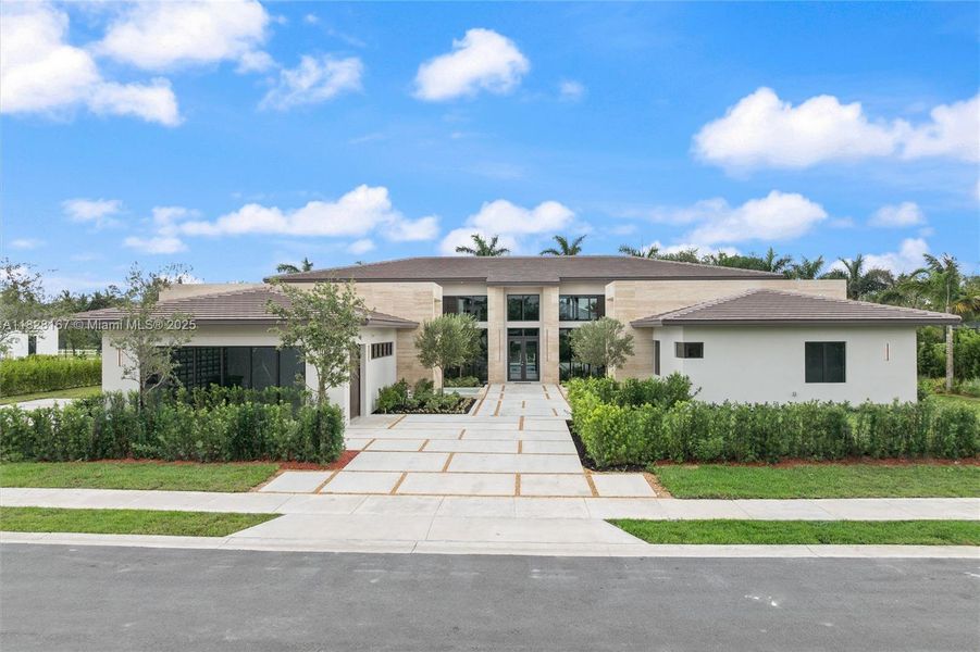 Front exterior of a new home in , Davie, FL, highlighting curb appeal (Image 23).