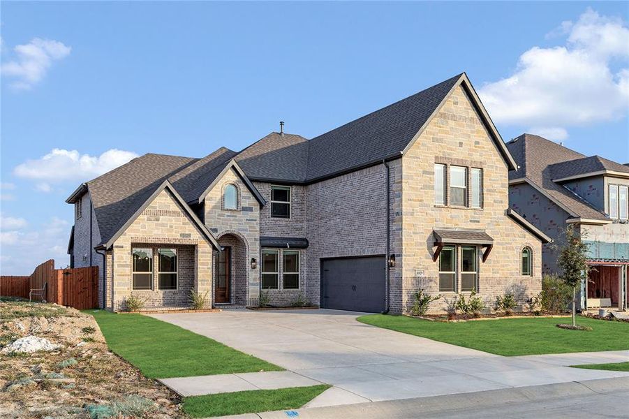 Front exterior of a new home in Country Lakes Classic 60, Argyle, TX, highlighting curb appeal (Image 2).