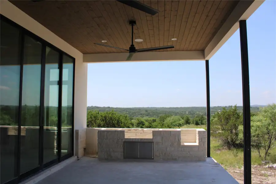 Beautiful view off dining patio. Outdoor kitchen with fridge and built-in grill. Beautiful view off dining patio. Outdoor kitchen with fridge and built-in grill.