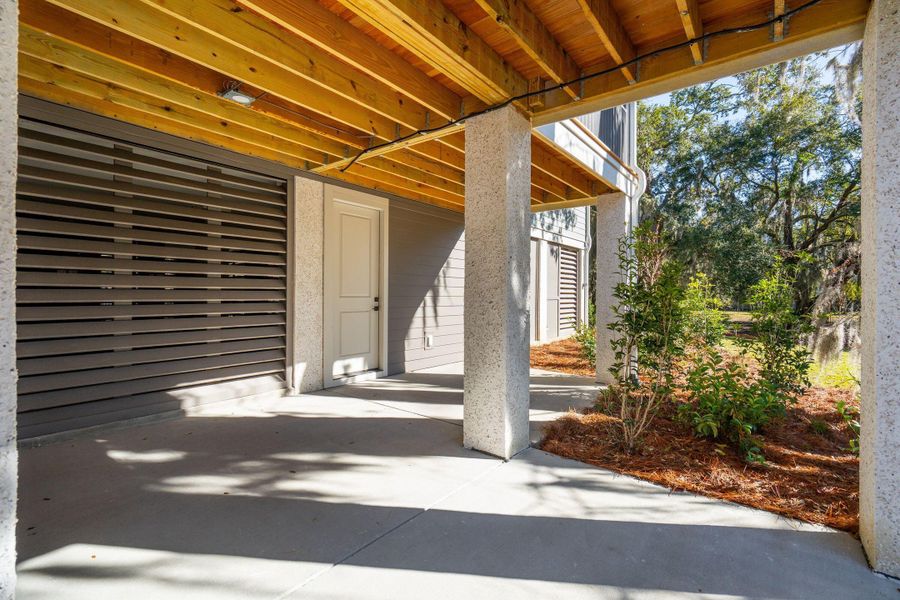 Exterior details and patio area of a home in , Johns Island (Image 42).