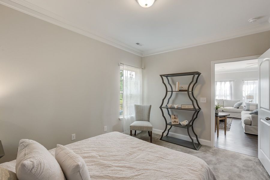 Furnished interior in a model home at Royal Pines in Trinity (Image 8).