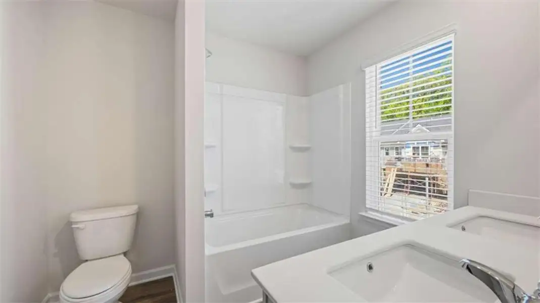Furnished interior view inside a new home in Independence Villas and Townhomes, Loganville (Image 3).