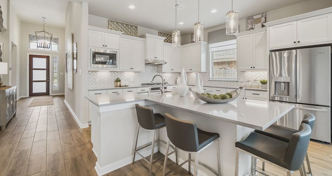 Representative furnished interior of a home built from the Lynnbrook by Chesmar Homes in Sienna Chateau, Missouri City (Image 6).