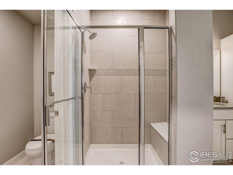 Primary shower. Photos of a previously built Cascade. Finishes may vary.
