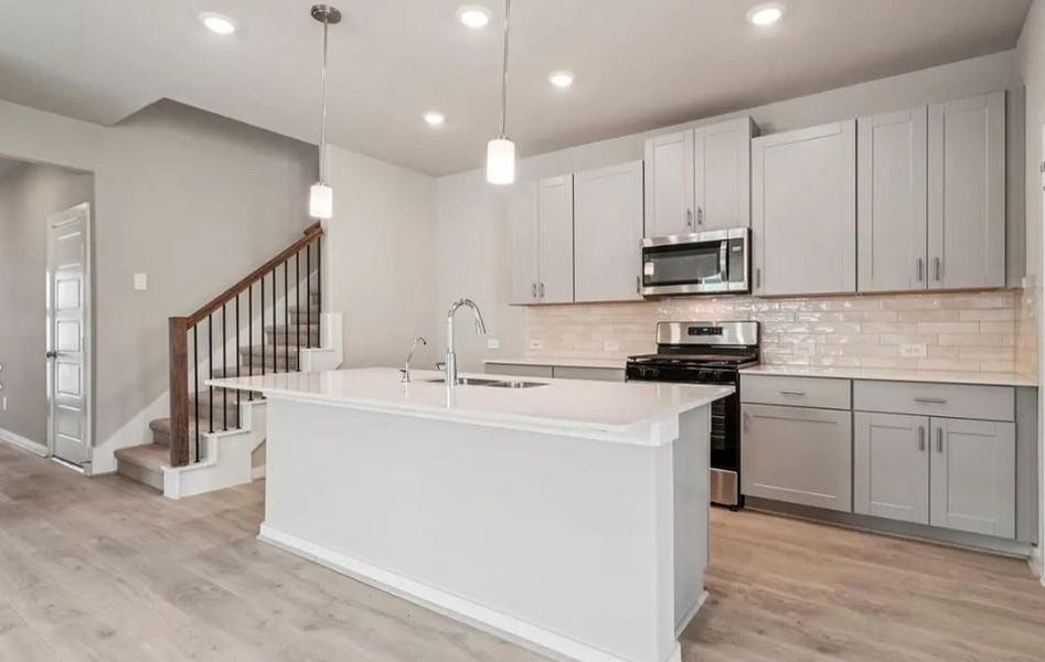 Photo is not of the actual home, but is an inspirational photo of builder’s model home and may depict options, furnishings, and/or decorator features that are not included