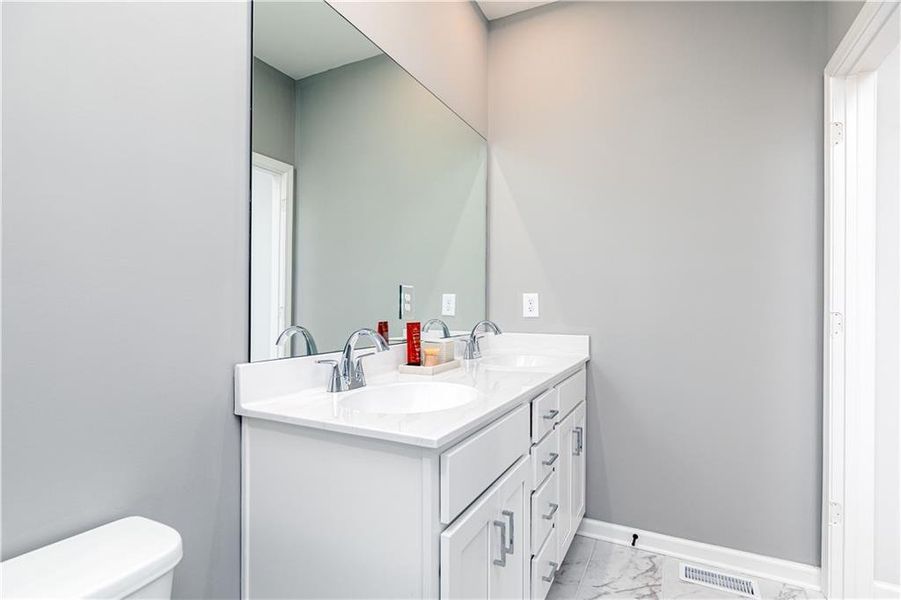 Image 66 of a home in The Beacon at Old Peachtree Townhomes. Image 66 of a home in The Beacon at Old Peachtree Townhomes.