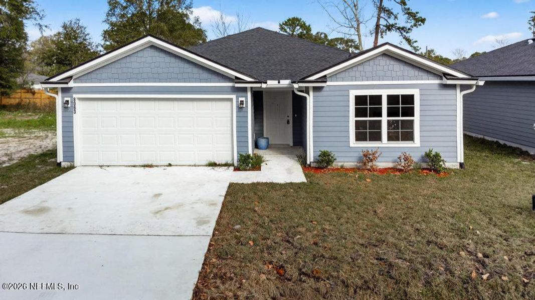 Front exterior of a new home in , Jacksonville, FL, highlighting curb appeal (Image 29).