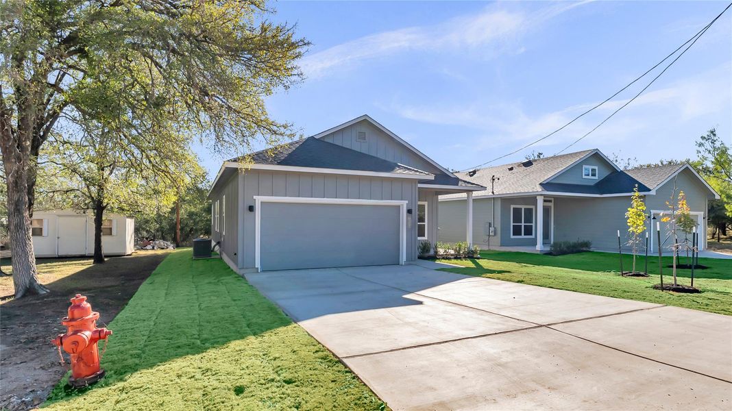 Front exterior of a new home in , Cottonwood Shores, TX, highlighting curb appeal (Image 15).