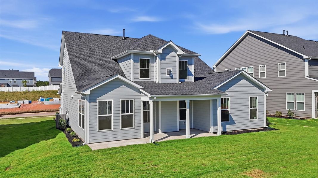 Exterior details and patio area of a home in Kayfield at Midway, Anderson (Image 3).