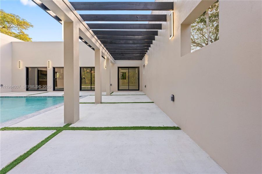 Exterior details and patio area of a home in , North Miami (Image 34).