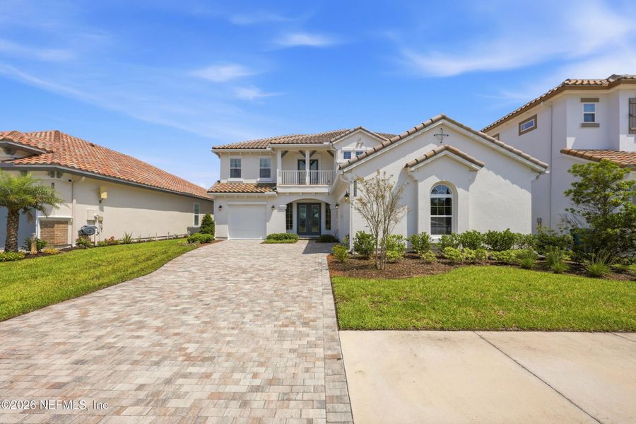 Front exterior of a new home in Tamaya, Jacksonville, FL, highlighting curb appeal (Image 28). Front exterior of a new home in Tamaya, Jacksonville, FL, highlighting curb appeal (Image 28).