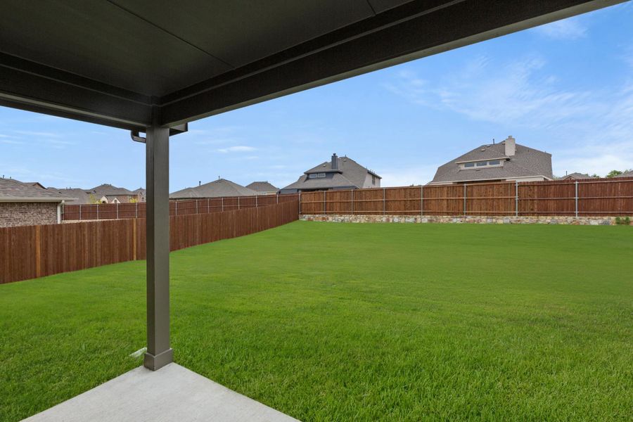 Front exterior of a new home in Waterscape, Royse City, TX, highlighting curb appeal (Image 14). Front exterior of a new home in Waterscape, Royse City, TX, highlighting curb appeal (Image 14).