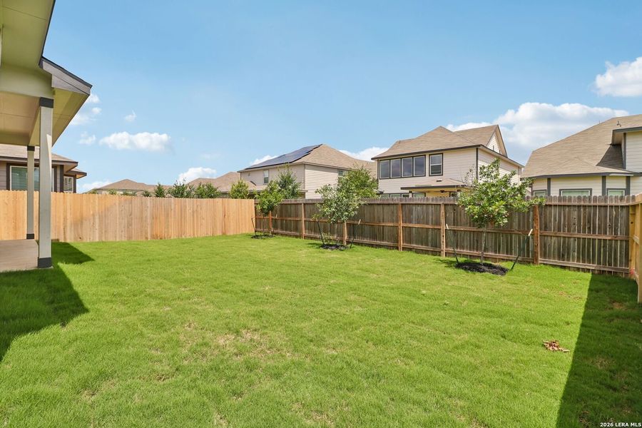 Exterior details and patio area of a home in Estancia Ranch - Premier Series, San Antonio (Image 3).
