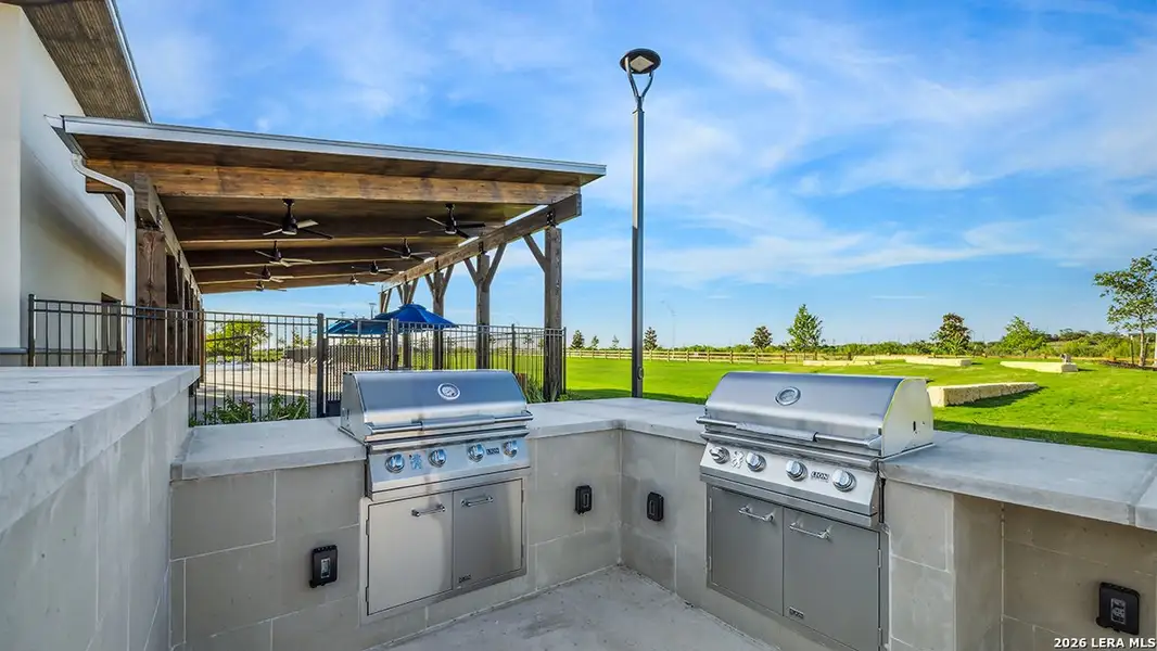 Exterior details and patio area of a home in Avenida, Converse (Image 2). Exterior details and patio area of a home in Avenida, Converse (Image 2).