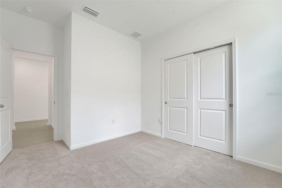 Spacious, unfurnished interior of a new home in Annabelle Estates, Winter Haven (Image 13).
