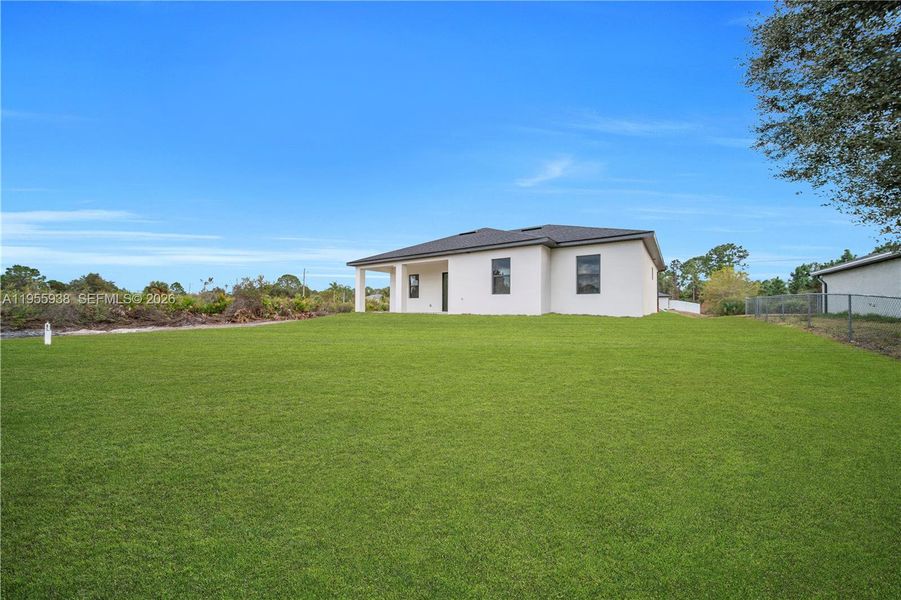 Exterior details and patio area of a home in , Lehigh Acres (Image 16).