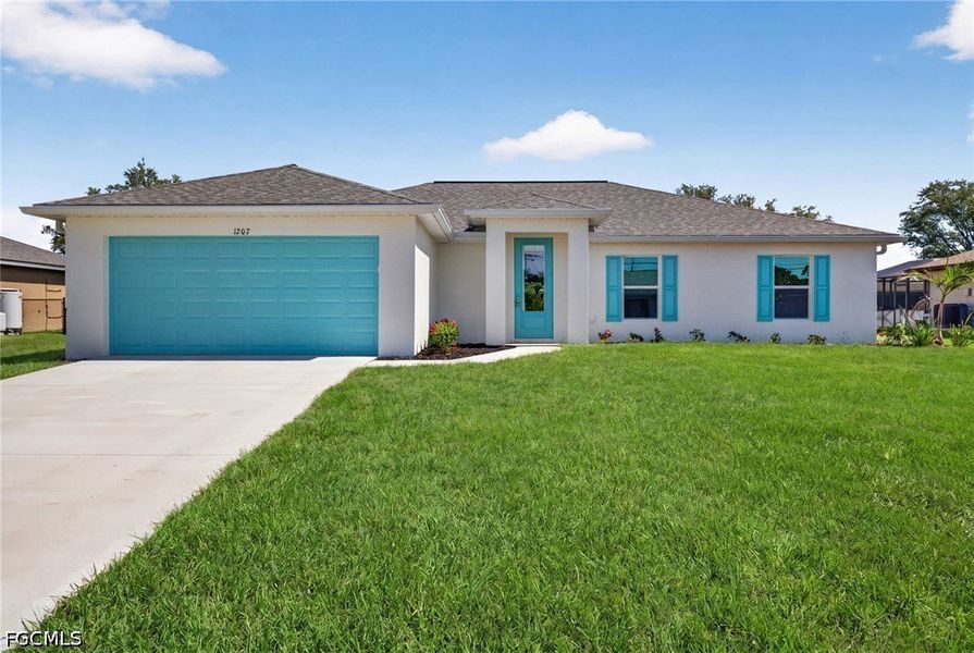 Front exterior of a new home in Cape Coral, Cape Coral, FL, highlighting curb appeal (Image 1). Front exterior of a new home in Cape Coral, Cape Coral, FL, highlighting curb appeal (Image 1).