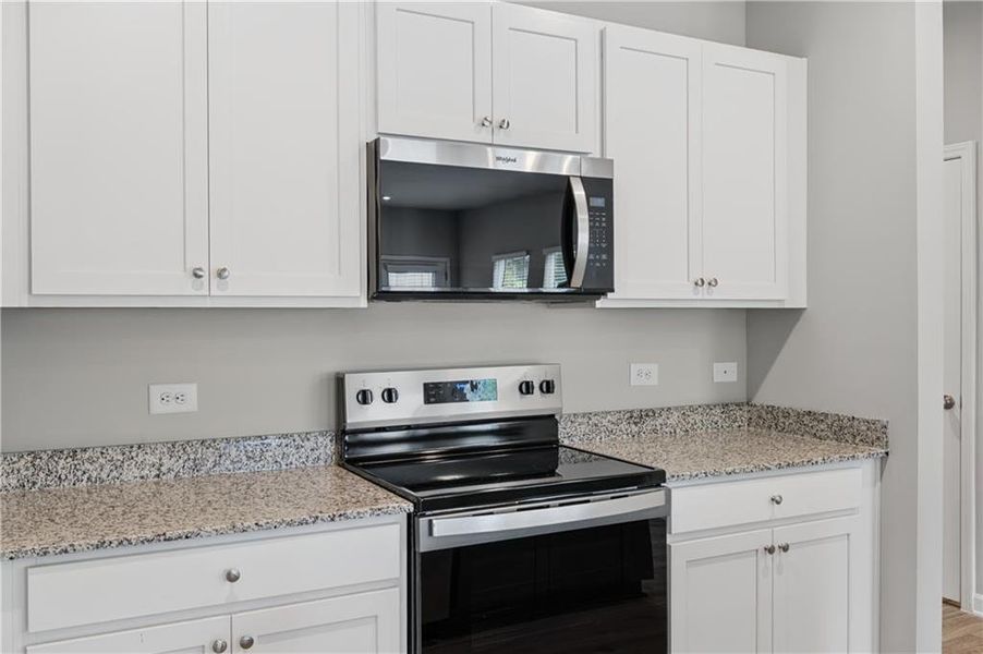 Furnished interior view inside a new home in Village Green, Adairsville (Image 5).