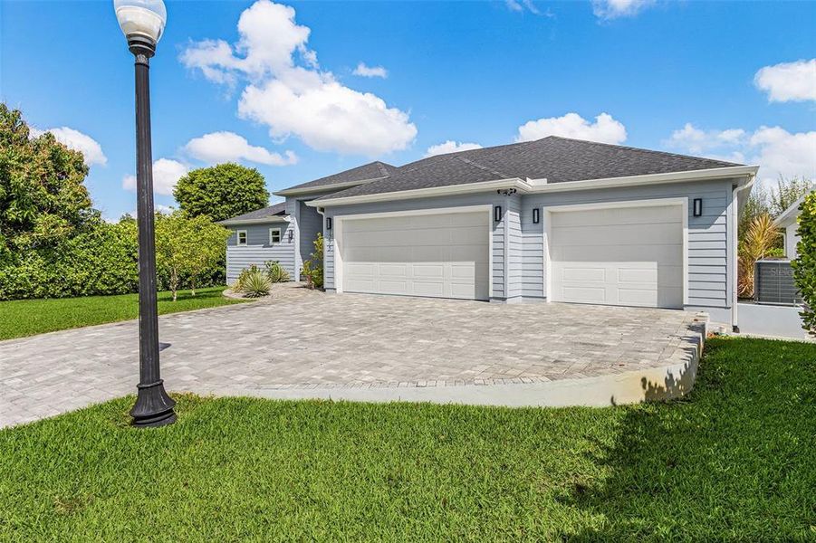 Front exterior of a new home in , Fort Myers, FL, highlighting curb appeal (Image 2). Front exterior of a new home in , Fort Myers, FL, highlighting curb appeal (Image 2).