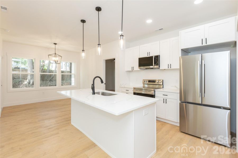 Furnished interior view inside a new home in , Concord (Image 5).